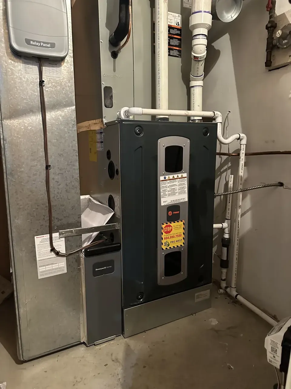 Trane gas furnace with a new media filter cabinet, installed by Pro West